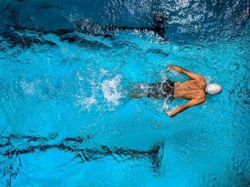 Man swimming in the pool